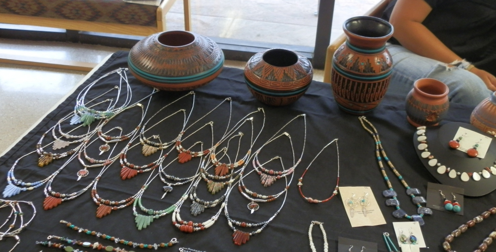 Examples of Navajo jewelry and pottery Examples of Navajo jewelry and pottery